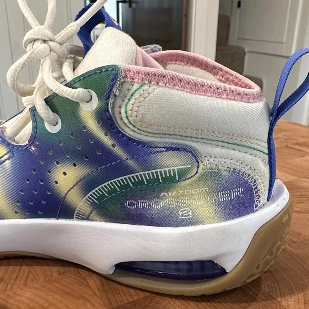 Nike Kids White Sneakers with Green and Purple Accents